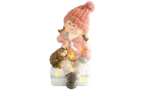 Postavička MagicHome Vianoce, Dievčatko sediac na taburetke s ježkom, 1 LED, polyresin, 10,5x10,5x19,5 cm